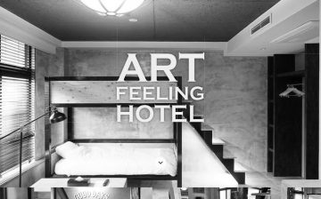 「デザイナーズホテル」×「サテンストライプの寝具」で感性が研ぎ澄まされる空間に